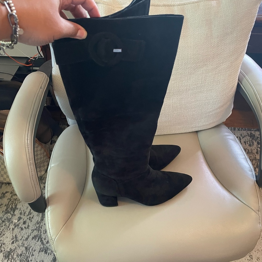 Tall black boots